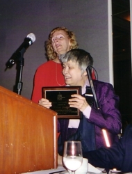 A surprised Helen Dodge receiving the Jacobus tenBroek award from President Nancy Burns